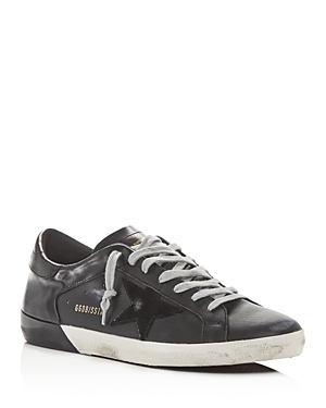 Click to view more detailed imagery on our partner's website Golden Goose Unisex Superstar Leather Low-Top Sneakers In Black