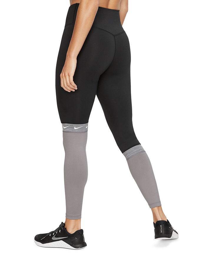 nike training high waist color block leggings in black and gold