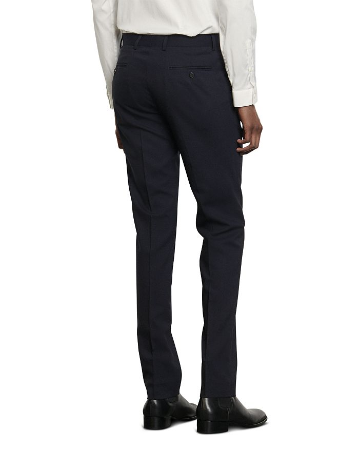 Shop Sandro Travel Slim Fit Suit Pants In Navy Blue