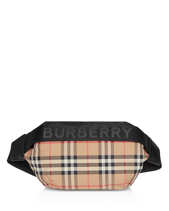 Burberry Medium London Check And Leather Bum Bag, $830, farfetch.com