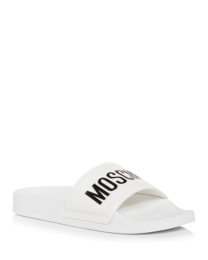 Moschino Embossed Logo Pool Slides In White