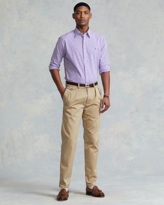 tan pants purple shirt