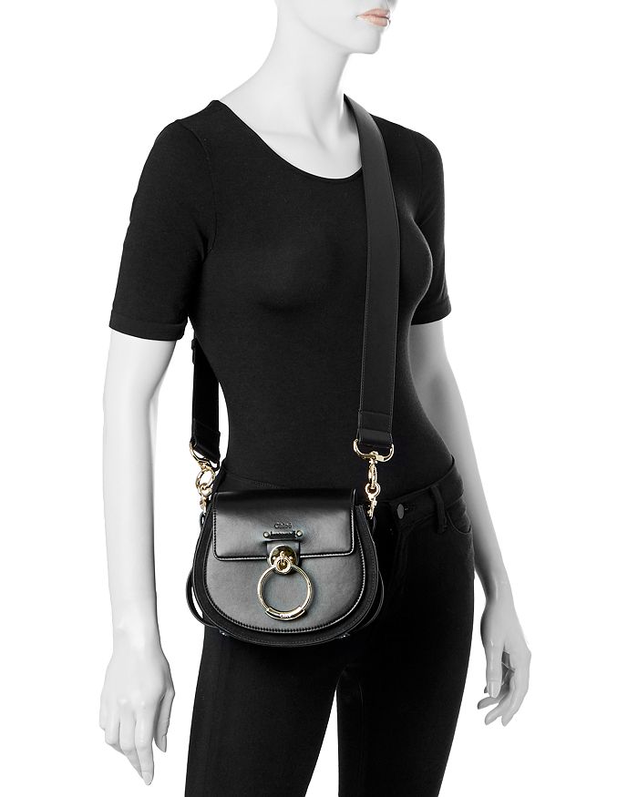 Shop Chloé Tess Small Leather Crossbody In Black/gold