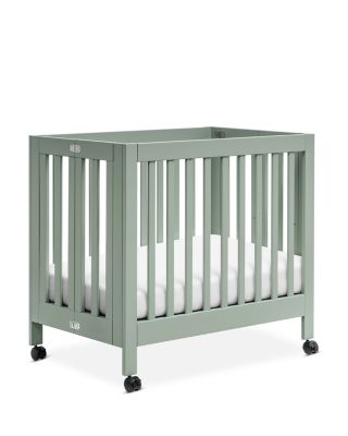 Mini crib in store on sale