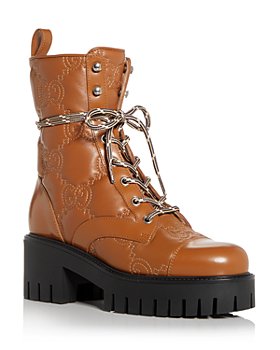 Gucci - Women's GG Quilted Platform Combat Boots