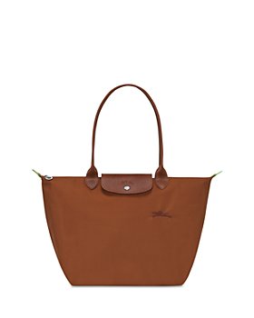 LONGCHAMP. Brown nylon canvas and leather satchel bag, P…