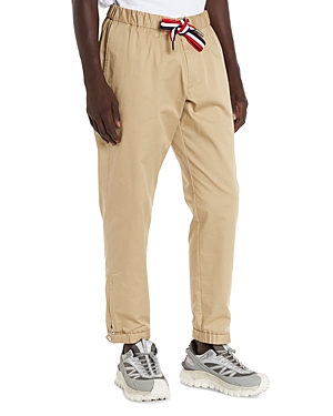 Shop Moncler Drawstring Trousers In Beige