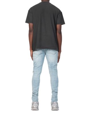 Dropped Slim Fit Destroyed Jeans in Light Indigo 