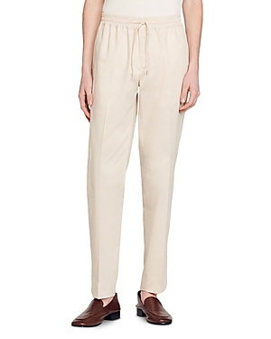 Sandro Pressed-crease Elasticated Drawstring Trousers In Ecru