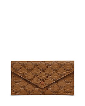 How to Convert Louis Vuitton Cosmetic Pouch into a Crossbody Bag  In this  video, we show you how you can quickly convert a Louis Vuitton Cosmetic  Pouch into a Crossbody Bag