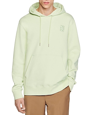 Shop Sandro Pullover Logo Hoodie In Anise
