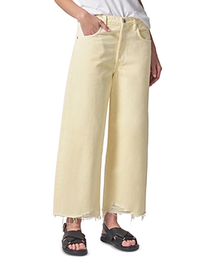 Shop Citizens Of Humanity Ayla Raw Hem Cropped Jeans In Limoncello