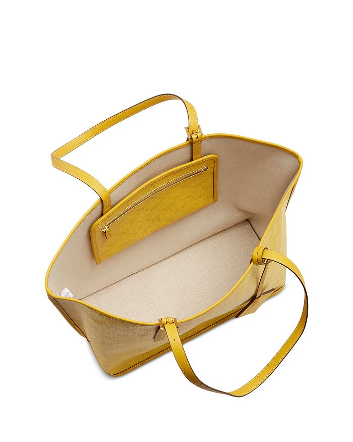 Shop Mcm Himmel Medium Lauretos Shopper Tote In Lemon Gold