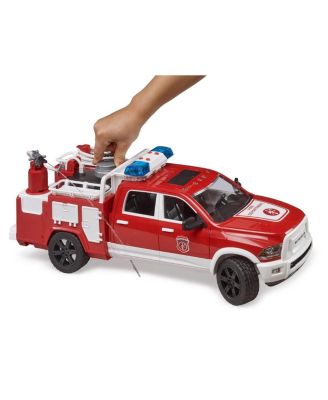  Unisex RAM Fire Service Truck with Light and Sound Module Storage compartments with doors on both sides, rotating water - Ages 11+