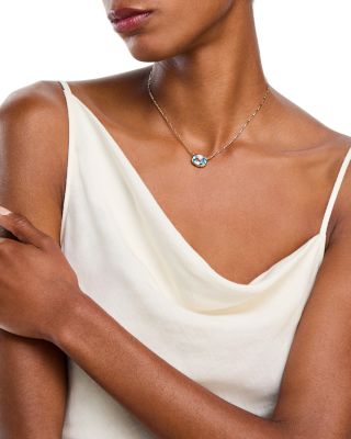 Sky Blue Topaz Oval Bezel Pendant Necklace in 14K Yellow Gold, 16-18"