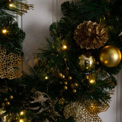 Pre-Lit Artificial Golden Frosted 9' Christmas Garland with Warm White LED Lights Pinecones, Berries and Ornaments