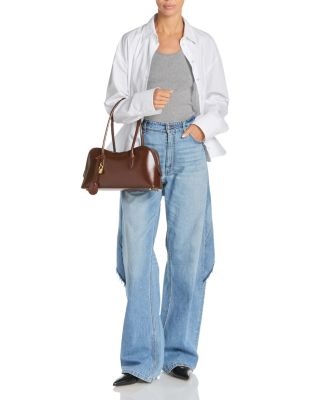 Mid Waist Relaxed Curve Deconstructed Jeans in Mid Blue