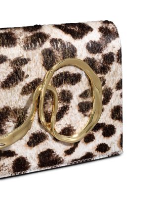 Twisted Side Handle Calf Hair Clutch