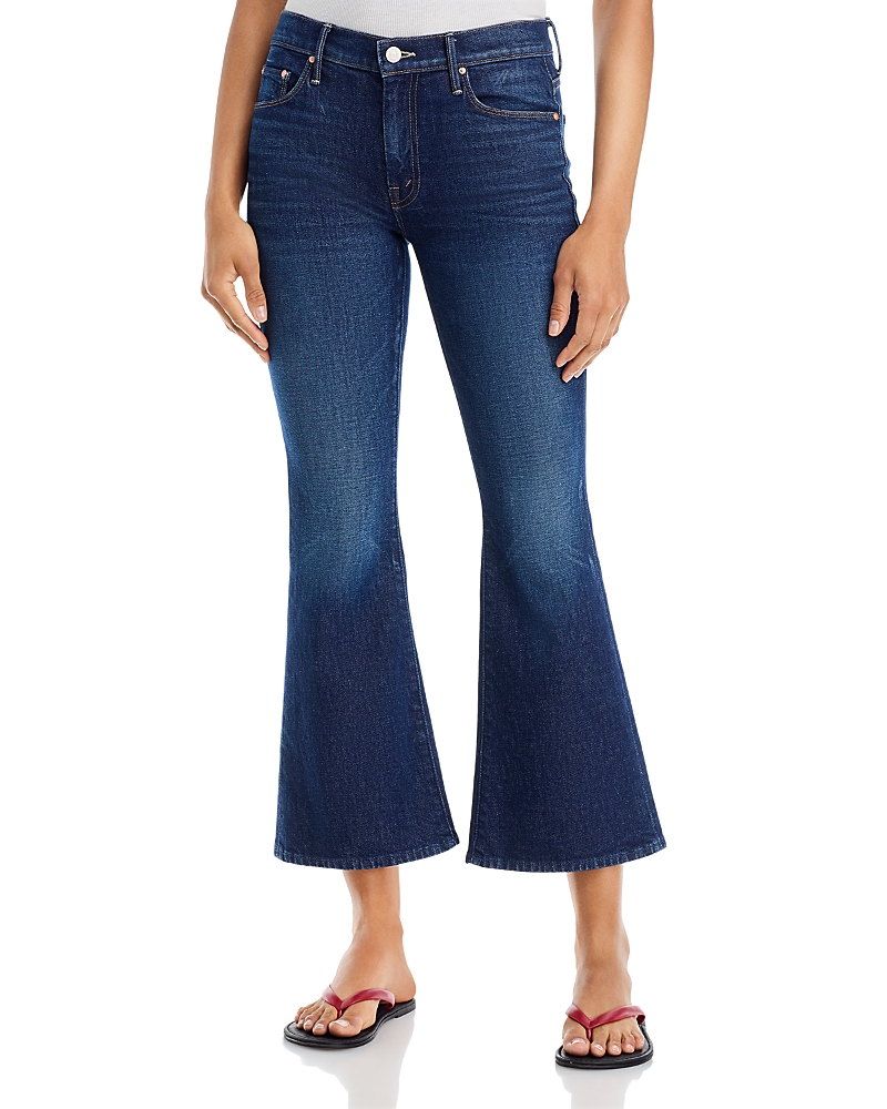 Mother Lil Weekender Mid Rise Flared Jeans in Kicks And Riffs