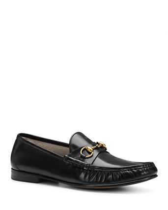 gucci men's dress shoes black leather lace-up formal with brand logo These Edgar loafers are crafted of leather Men's Henry Leather Lace-Up Shoes