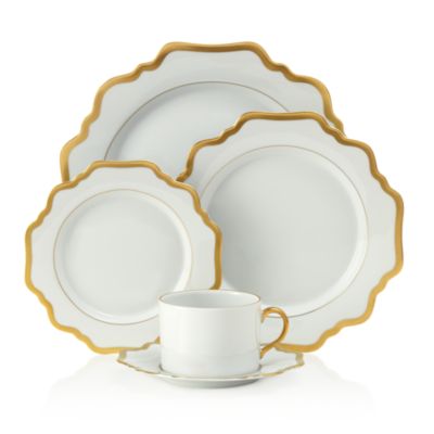 white and gold dishes