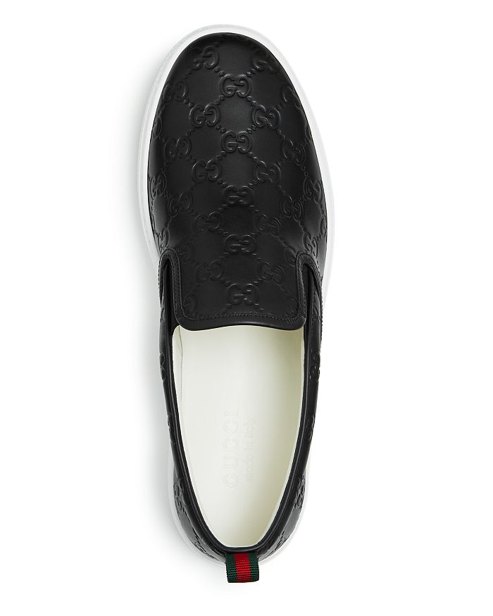 Gucci Men's Logo Embossed Leather Slip-On Sneakers In 1174 Black | ModeSens