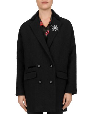 brooch in coat