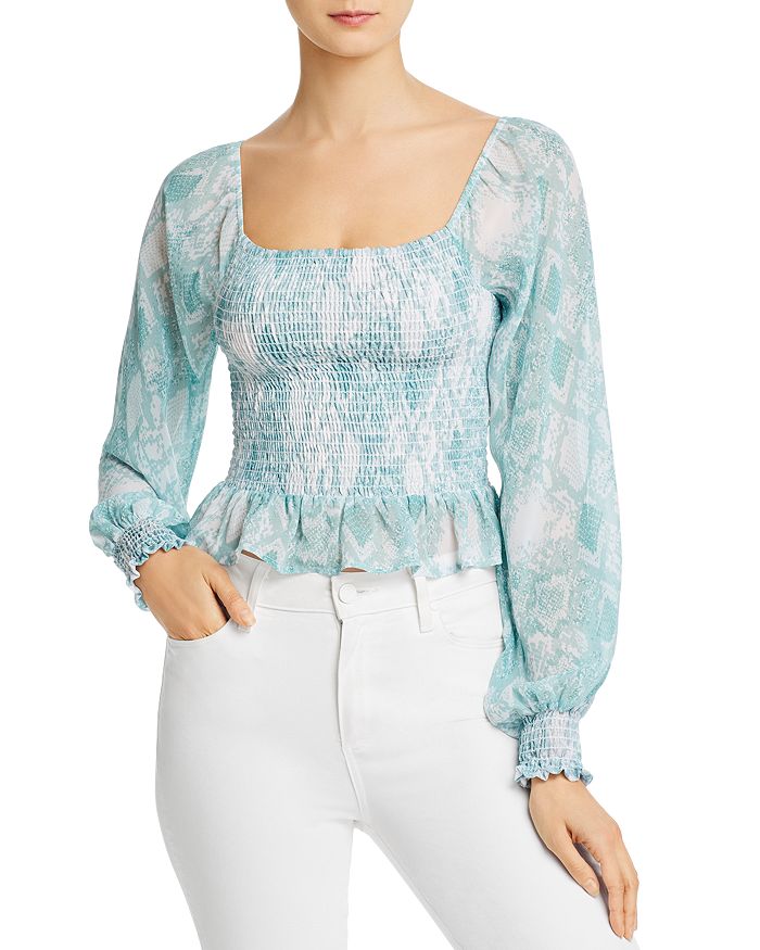 Snakeskin peplum top on sale