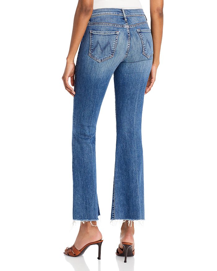 Shop Mother The Weekender Mid Rise Flared Jeans In Walking On Coals
