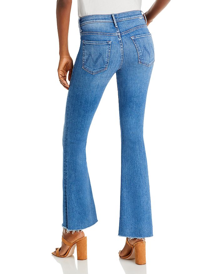 Shop Mother The Weekender Mid Rise Flared Jeans In A Groovy Kind Of Love