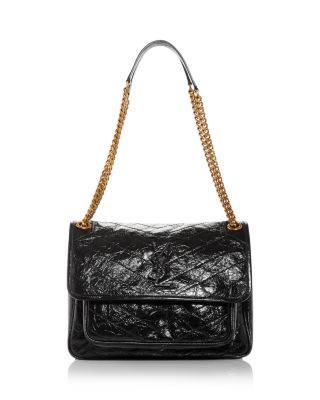 quilted leather clutch bag