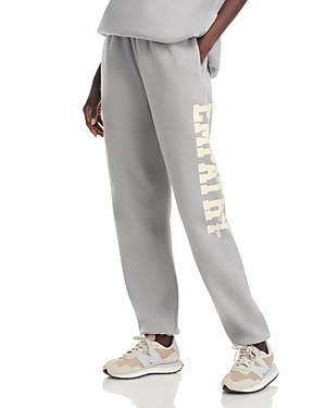 Shop The Mayfair Group Empathy Graphic Sweatpants In Grey/yellow
