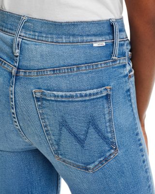 The Weekender Mid Rise Flared Jeans in Layover