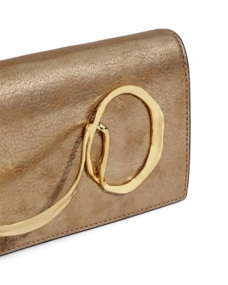 Twisted Side Handle Clutch