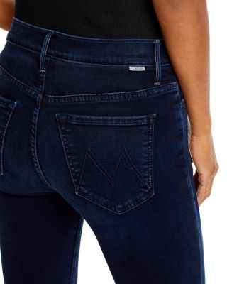 The Weekender Mid Rise Flared Jeans in Chip On My Shoulder