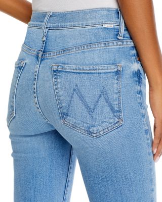 The Weekender Mid Rise Flared Jeans in Blessing in Disguise