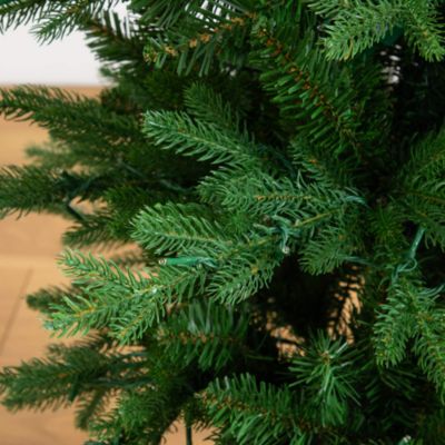 Pre-Lit Artificial 4.5&#39; Christmas Tree in Decorative Planter with Clear LED Lights