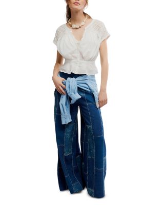 Patches Mid Rise Wide Leg Flare Jeans in Indigo Patch