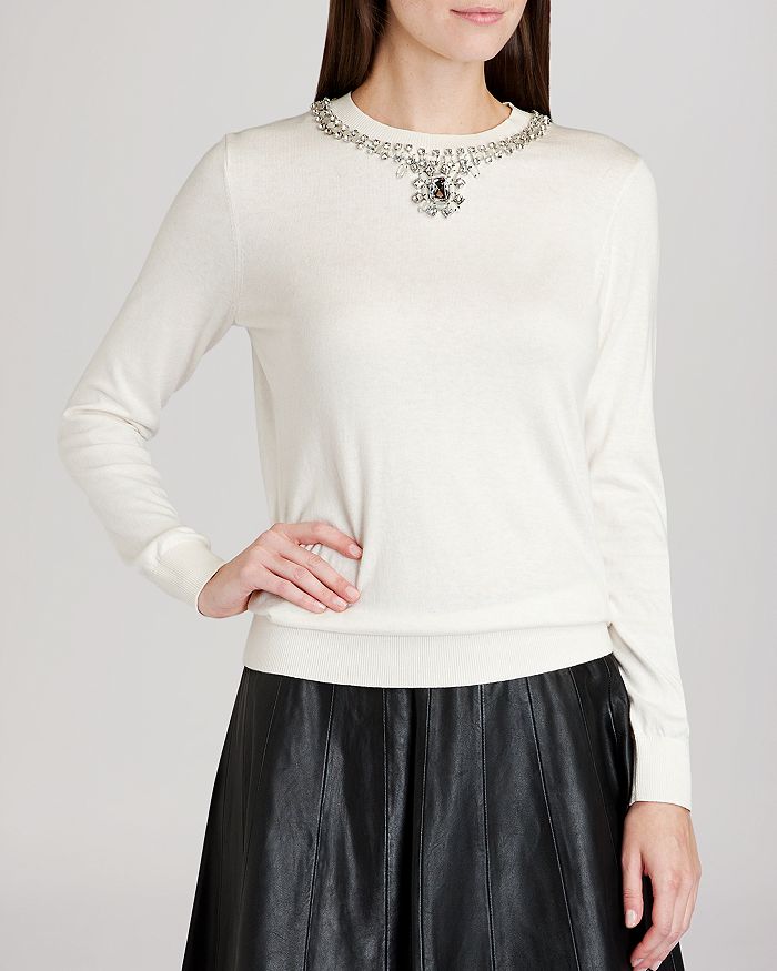 Sweater with embellished clearance neckline