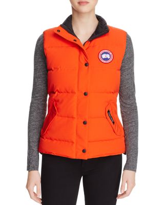 orange canada goose gilet