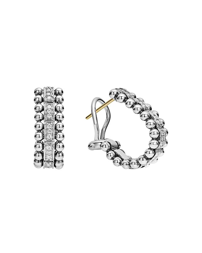 Shop Lagos Sterling Silver Caviar Spark Diamond Oval Hoop Earrings In White/silver