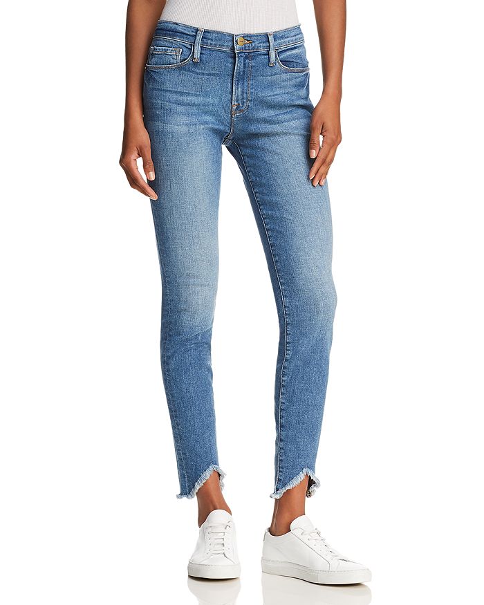 FRAME Le Skinny De Jeanne Triangle Hem Jeans in White Chapel