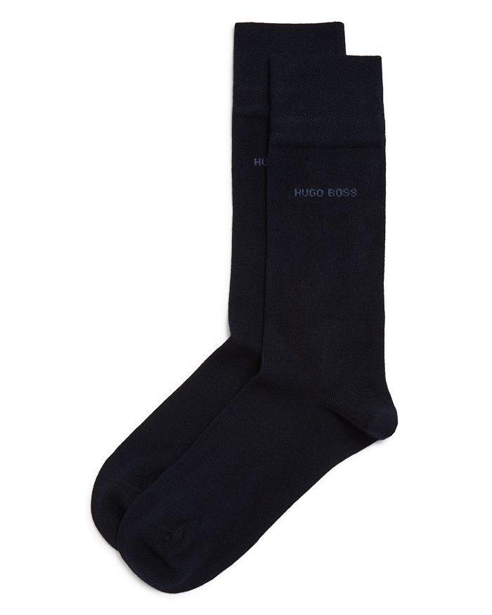 Shop Hugo Boss Edward Solid Dress Socks In Dark Blue