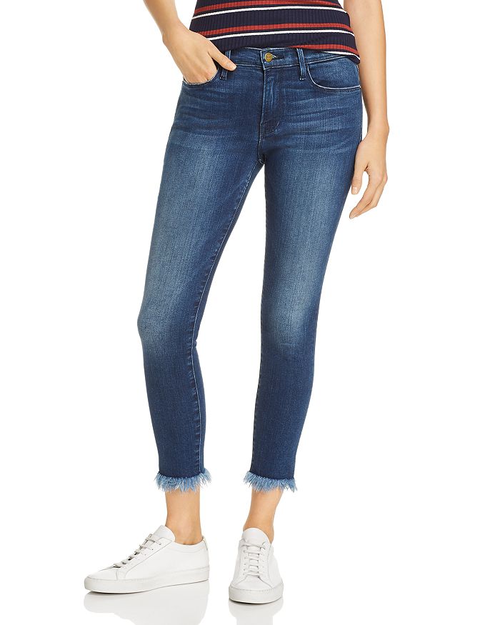 Shredded hem jeans best sale