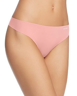 Calvin Klein Invisibles Thong In Pomelo