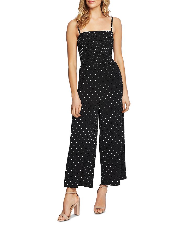 Cece By Cynthia Steffe Smocked Dot Print Jumpsuit In Rich Black
