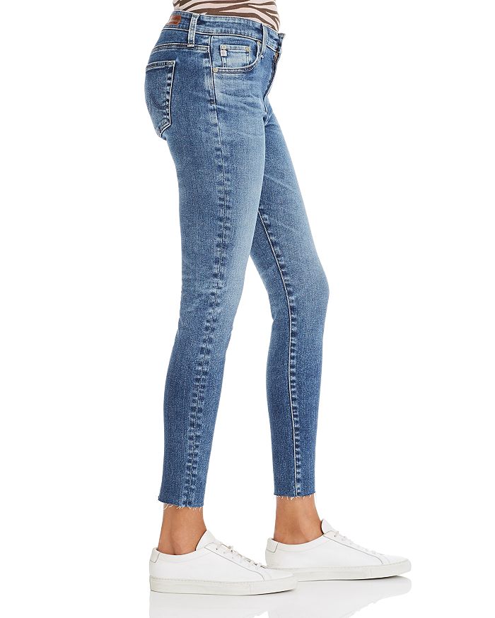 Shop Ag Farrah High Rise Raw Hem Ankle Skinny Jeans In 12 Years Fluid