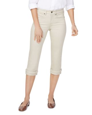 white cropped jeans with frayed hem