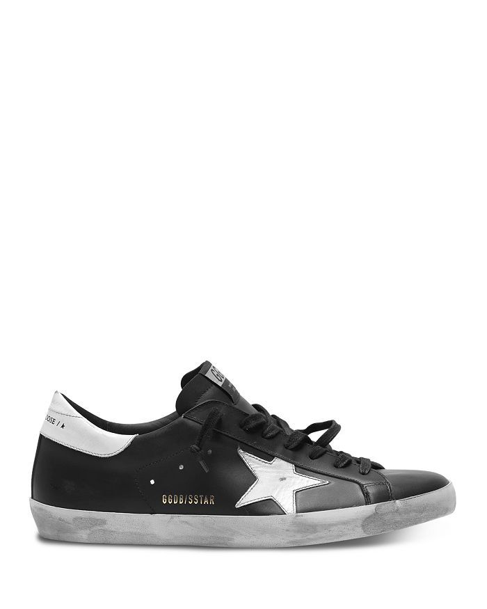 Golden Goose 'super-star' Black Low Top Sneakers With Logo Patch And Suede Details In Leather Man In Black/white