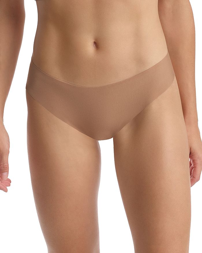 Shop Commando Butter Mid-rise Thong In Toffee